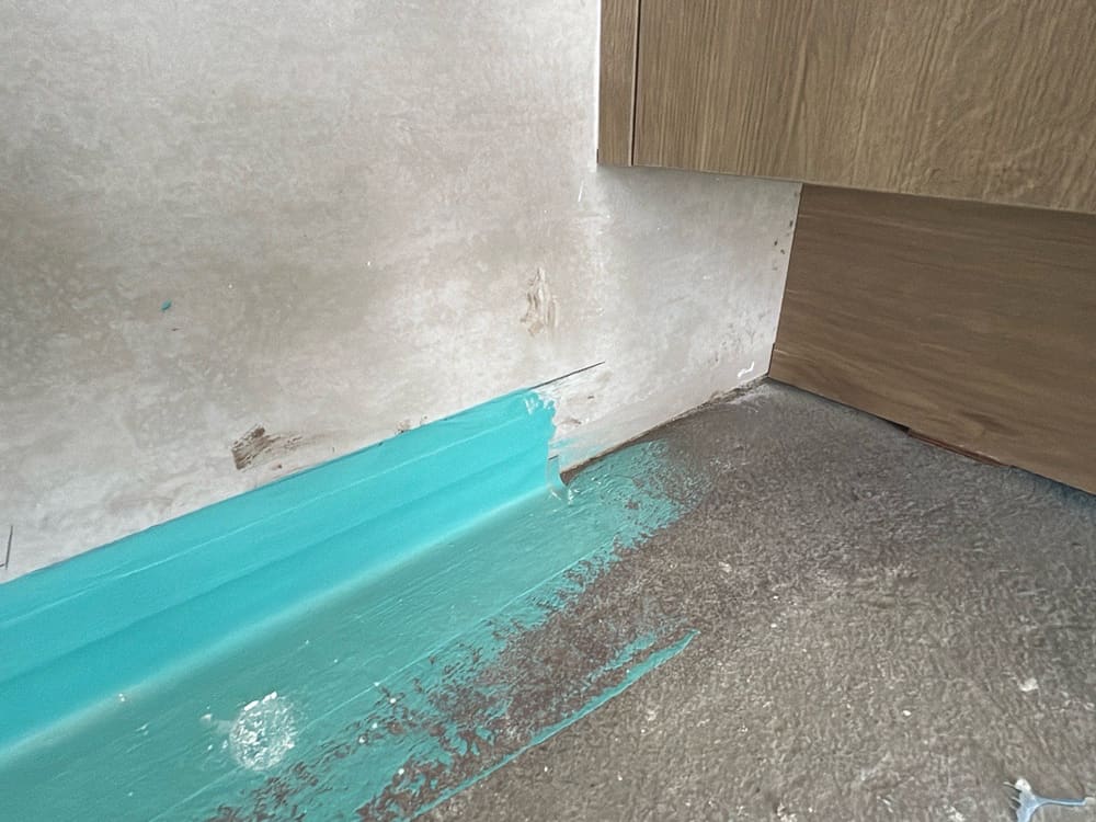 Behind vanity, recorded during a waterproofing inspection in Beveridge